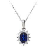 1.1ct Oval Sapphire And 0.25ct Diamond Cluster Pendant In UK Hallmarked 9ct White Gold